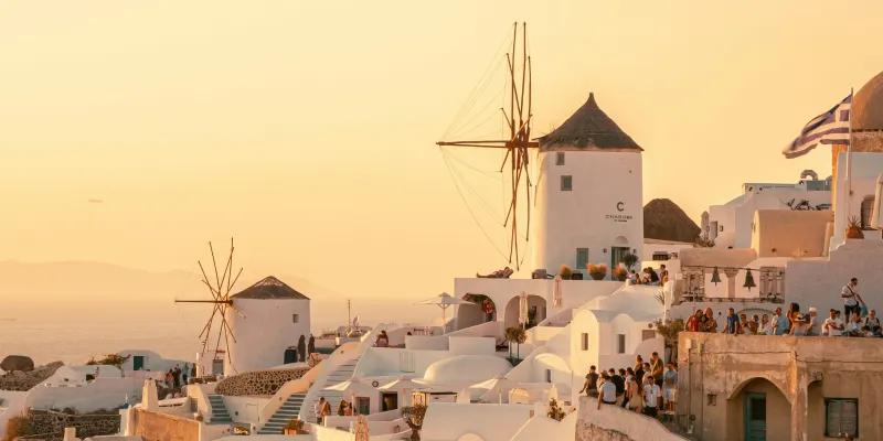 Oia santorini greece windmills sunset